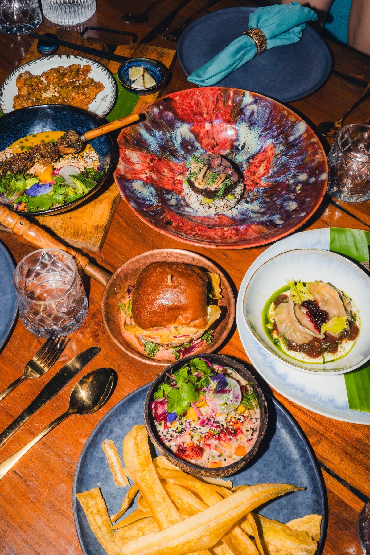 A table of plates shared between friends