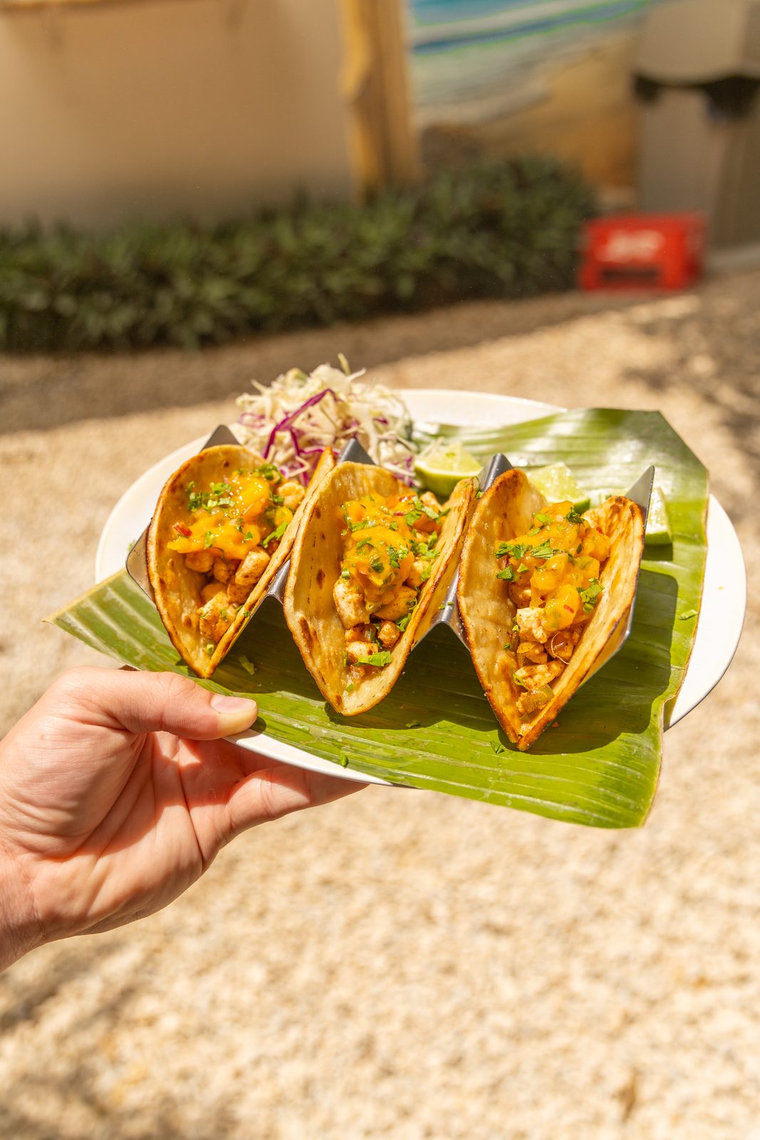 Fish tacos served on a banana leaf